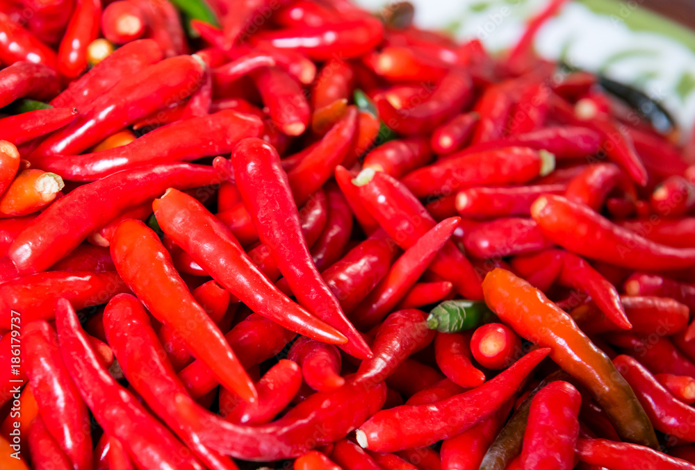 Hot Spicy chilli peppers background, select focus.