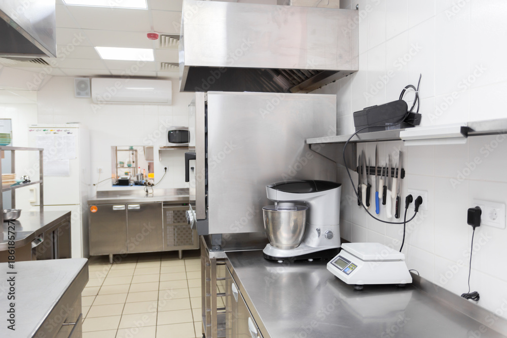 Modern kitchen equipment in a restaurant Modern kitchen equipment in a restaurant