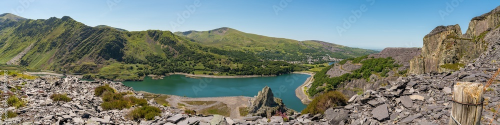 View from Dinorwic Quarry, Gwynedd, Wales, UK - with Llyn Peris, the Dinorwig Power Station Facilities and Llanberis in the background View from Dinorwic Quarry, Gwynedd, Wales, UK - with Llyn Peris, the Dinorwig Power Station Facilities and Llanberis in the background