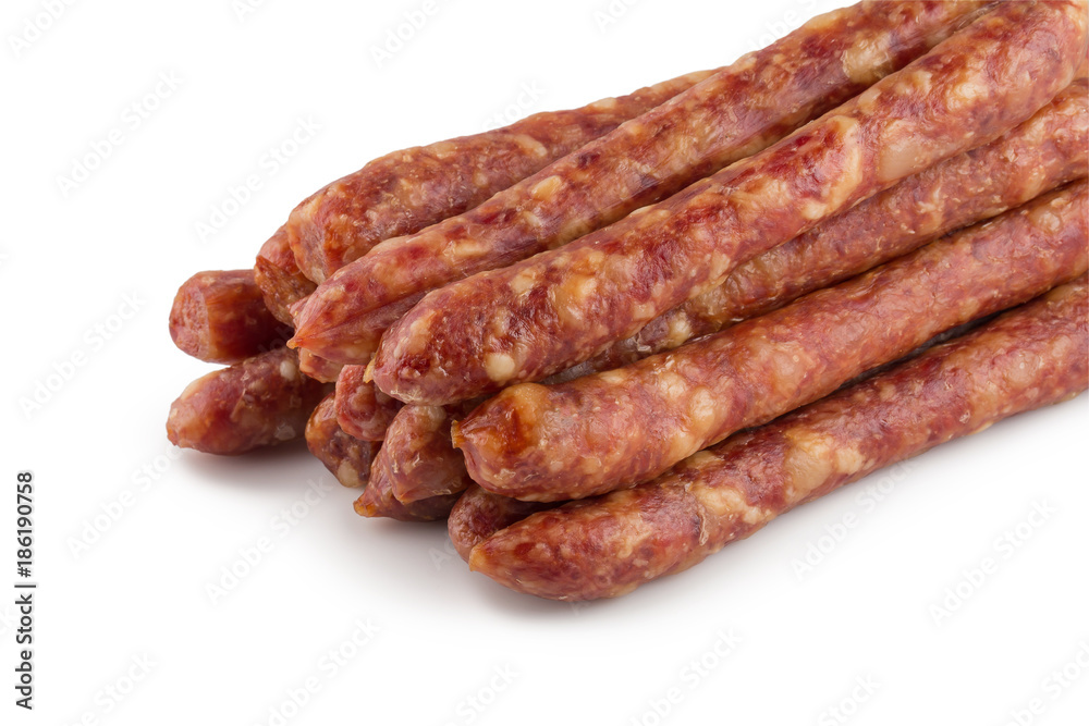 Chinese sausage and chinese sausage sliced for cook isolated on a white background Chinese sausage and chinese sausage sliced for cook isolated on a white background