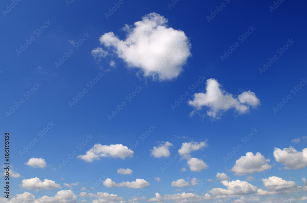 Light cumulus clouds against the blue sky. Light cumulus clouds against the blue sky.