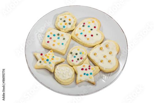 Christmas cookies on plate isolated on white background top view