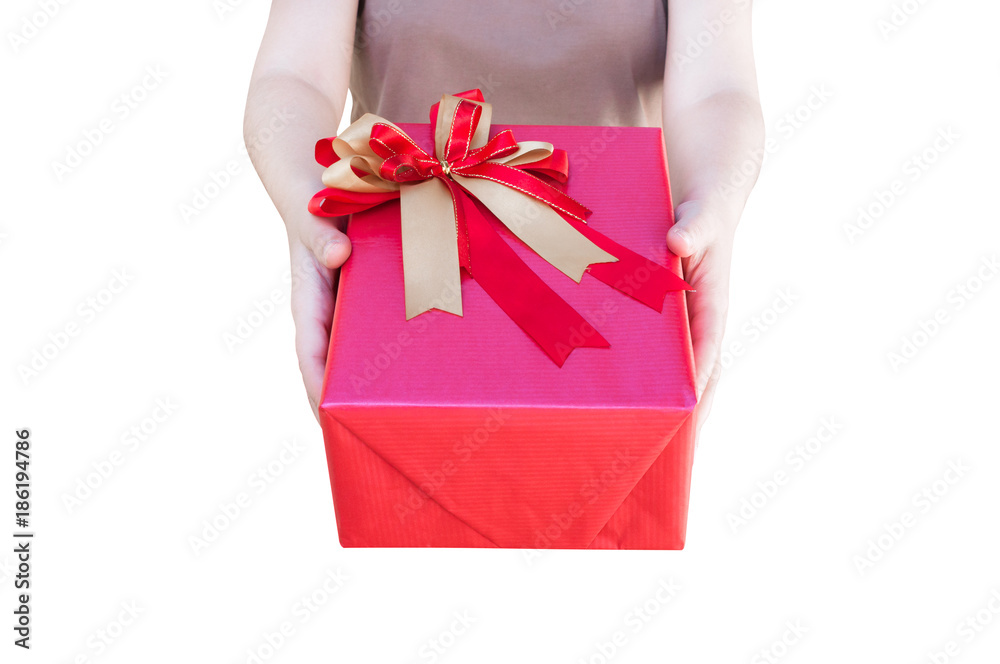 Premium Photo  Woman opens christmas gift box in red wrapping paper on  christmas tree hand background close up
