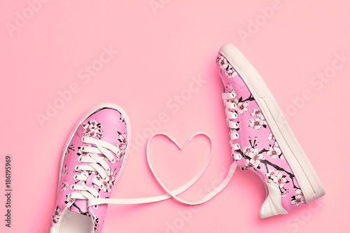 Fashion Trendy Trainers with Heart. Love, Hipster Set. Vanilla Pink Color. Minimal Style. Summer Floral Sneakers. Flat lay. Spring Girl. Art Design. Valentines day