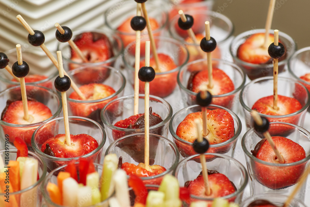 Catering food table of appetizers, snacks and canapes