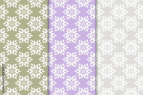 Set of colored floral ornaments. Vertical seamless patterns