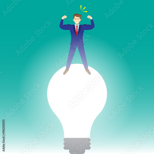 Businessman Standing On Light Bulb