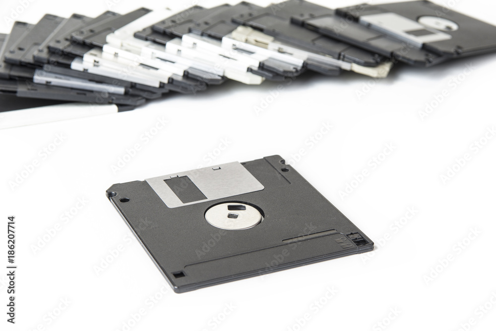 Old floppy disks for computer on the white