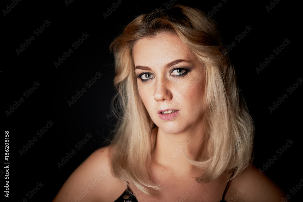 Beautiful blonde, retro style. Hairstyle in the style of Abba. Disco Beautiful blonde, retro style. Hairstyle in the style of Abba. Disco