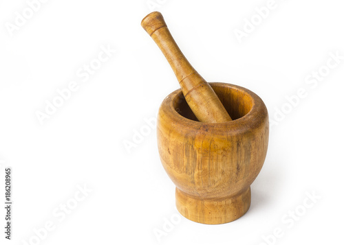 Wood mortar with pestle on the white background