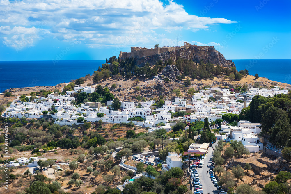 View of village, bay and Acropolis of Lindos (Rhodes, Greece)