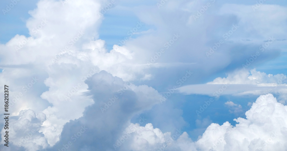 The white cloud and blue sky background