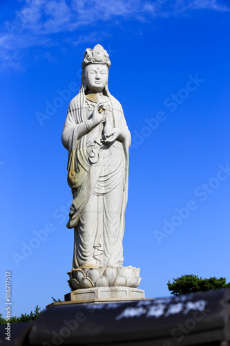 The largest stone statue of Guan yin at the top of the hill of Naksan temple  It is the oldest Buddhist temple in the north of Naksan Beach  South Korea.Oct 5  2017