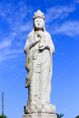 The largest stone statue of Guan yin at the top of the hill of Naksan temple  It is the oldest Buddhist temple in the north of Naksan Beach  South Korea.Oct 5  2017
