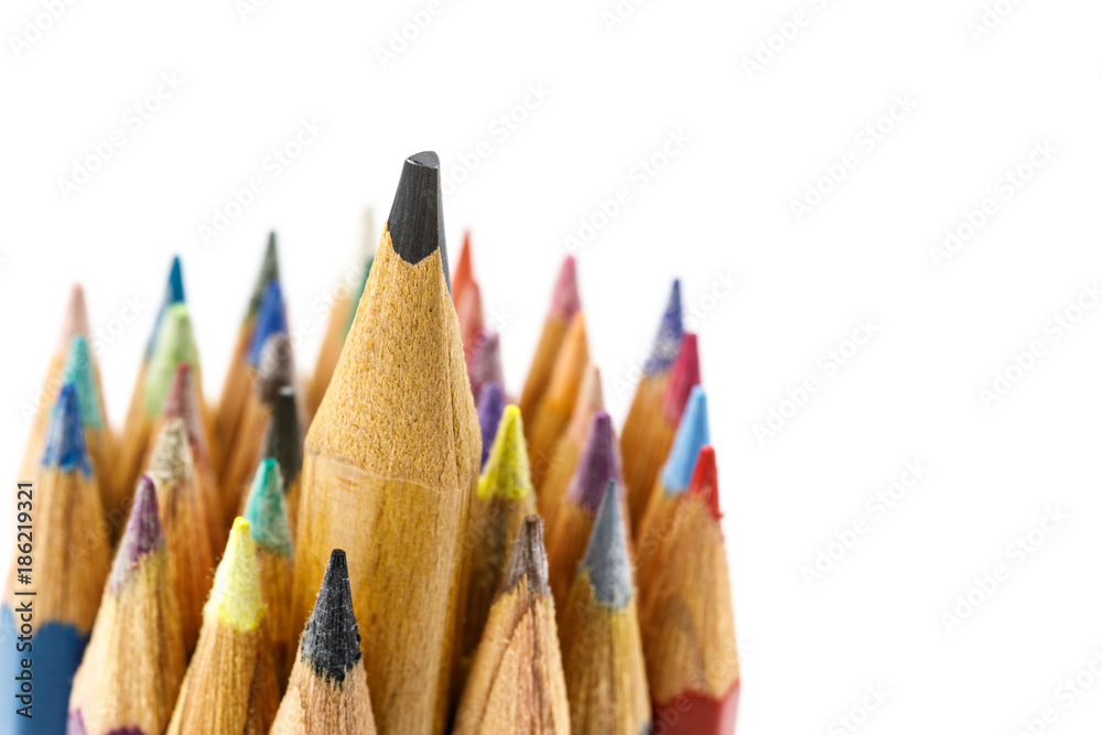 Focus on pencil lead with colored pencil surrounded on white background isolated with copy space Focus on pencil lead with colored pencil surrounded on white background isolated with copy space