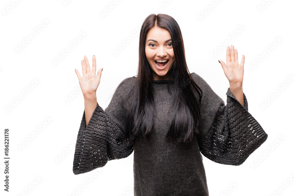Amazed woman looking at camera isolated on a white Amazed woman looking at camera isolated on a white