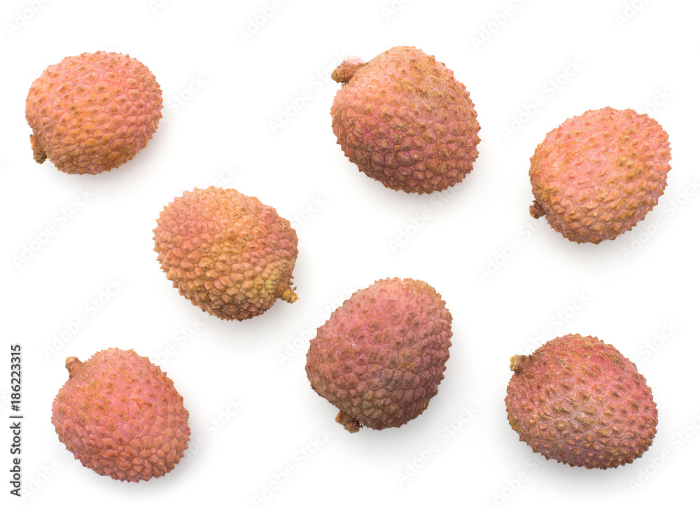 Lychee stack top view isolated on white background ripe pink fresh berries. Lychee stack top view isolated on white background ripe pink fresh berries.