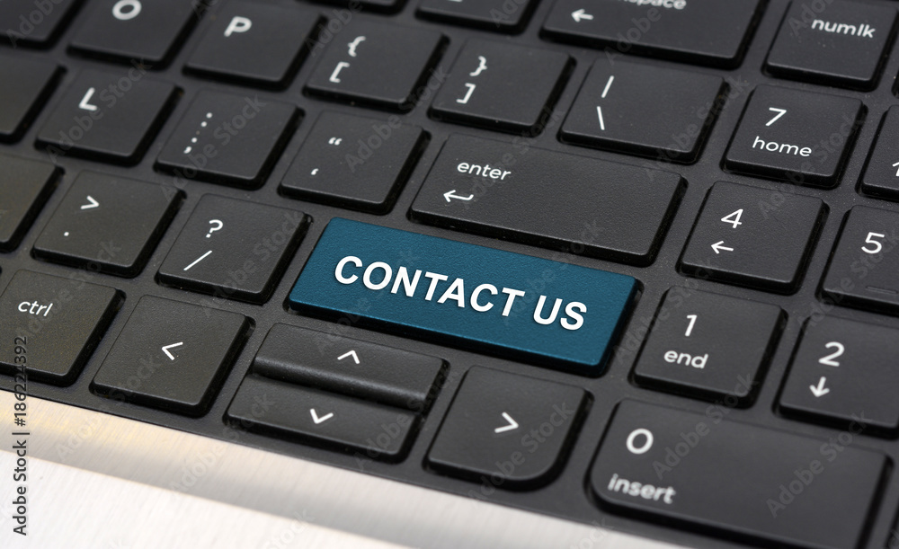 Contact Us Word on Laptop keyboard closeup Contact Us Word on Laptop keyboard closeup