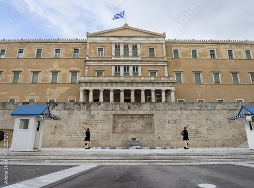 Change of honor guard - euzone - at the grave of an unknown soldier in the square near the Greek parliament in Athens photo