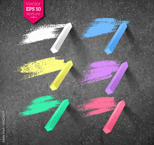Pieces of colored chalks with shadow