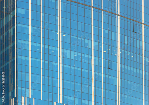 Clouds Reflected in Windows of Modern Office Building