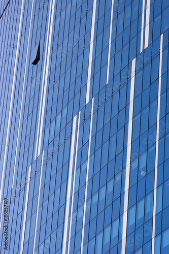 Clouds Reflected in Windows of Modern Office Building