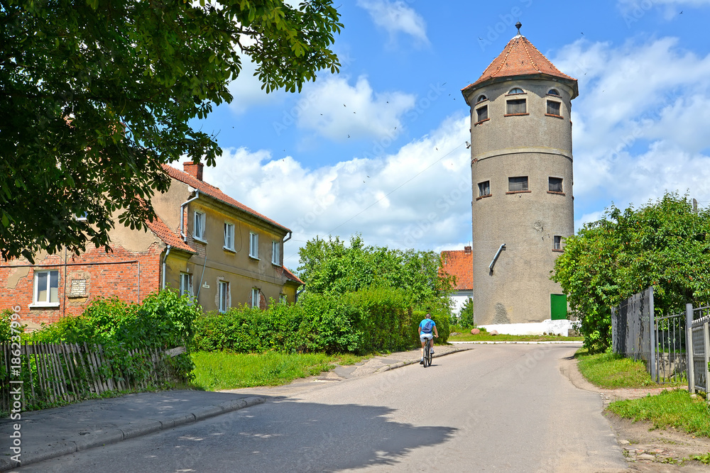 Urban view with a water tower. Gvardeysk, Kaliningrad region