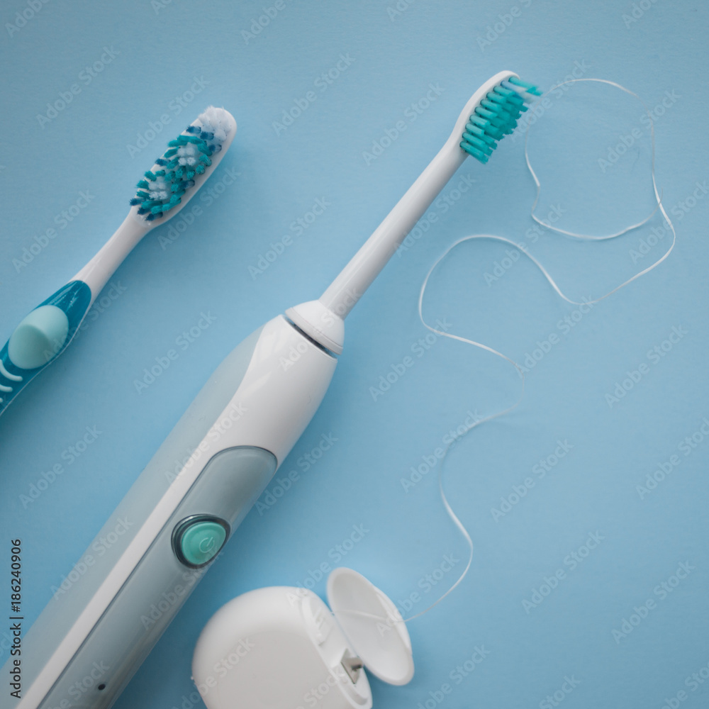 A set of sonic toothbrush, dental floss and classic toothbrush A set of sonic toothbrush, dental floss and classic toothbrush