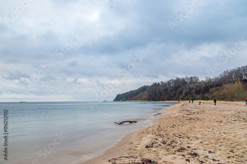 Fototapeta Naklejka Na Ścianę i Meble -  Beach at cloudy day on Baltic sea in december 2017. Beach on Babie Daly in Gdynia, Poland.