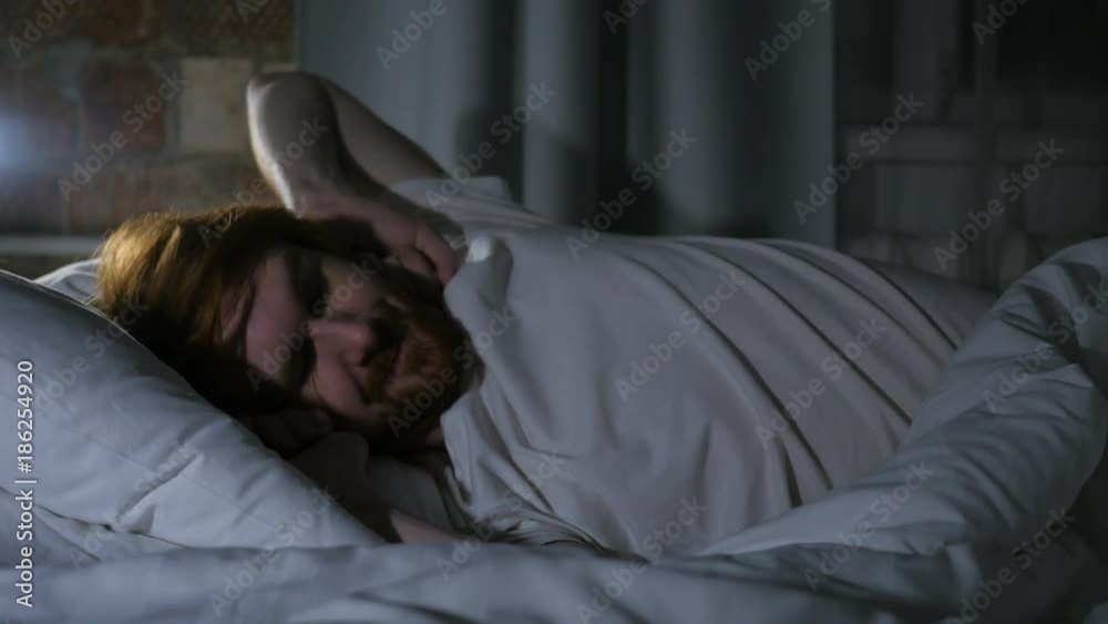 Redhead Beard Man Waking Up and Leaving Bed in Morning Redhead Beard Man Waking Up and Leaving Bed in Morning