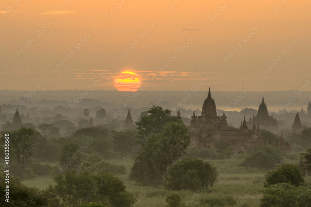 Pagodas and temples with a misty sunrise