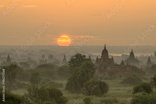 Pagodas and temples with a misty sunrise