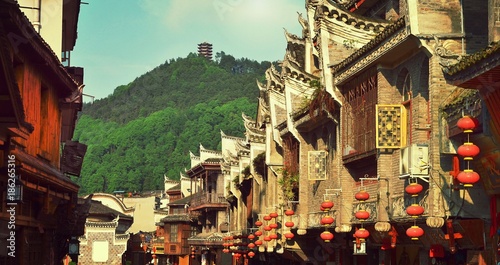 Fenghuang, China - May 15, 2017: Shops street near Phoenix Hong Bridge in Fenghuang