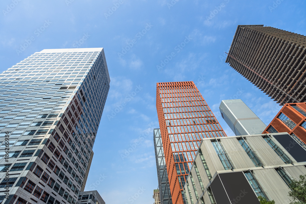 Modern office building against blue sky. Modern office building against blue sky.