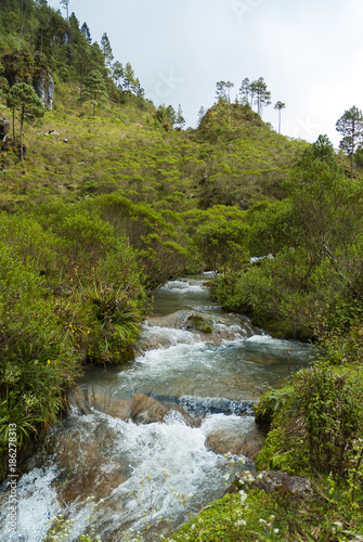 River between mountains and cloud forest, pure water, fresh air and pure in Huehuetenango, Guatemala, Central America.