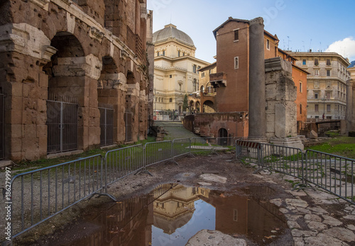 Rome (Italy) - The Tiber river and the monumental Lungotevere with 'Isola Tiberina' island, jewish district and 'Teatro Marcello' ruins photo