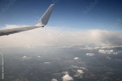 airplane wing looking out of the window © herlanzer