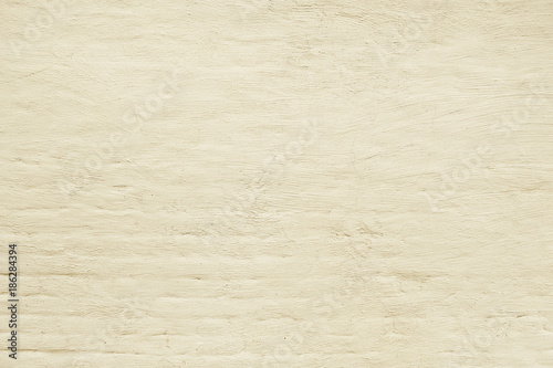 Old beige brick wall background texture