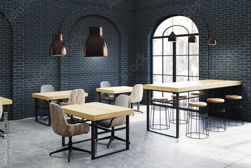Black brick cafe corner, wooden tables