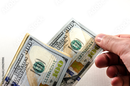 pay my debts. a man is giving away an hundred dollar bills