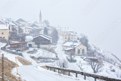 Guarda village at snowfall, Lower Engadine, Graubunden; Switzerland