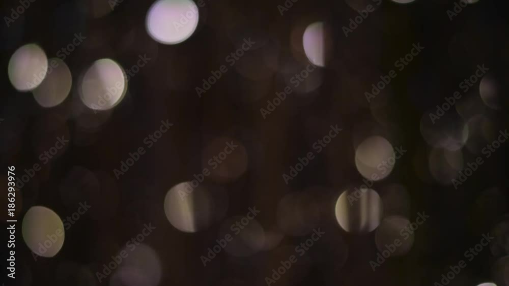Bright twinkling lights against a black background Bright twinkling lights against a black background