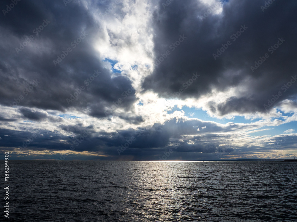 Fototapeta premium Beautiful sky over the sea after the storm.