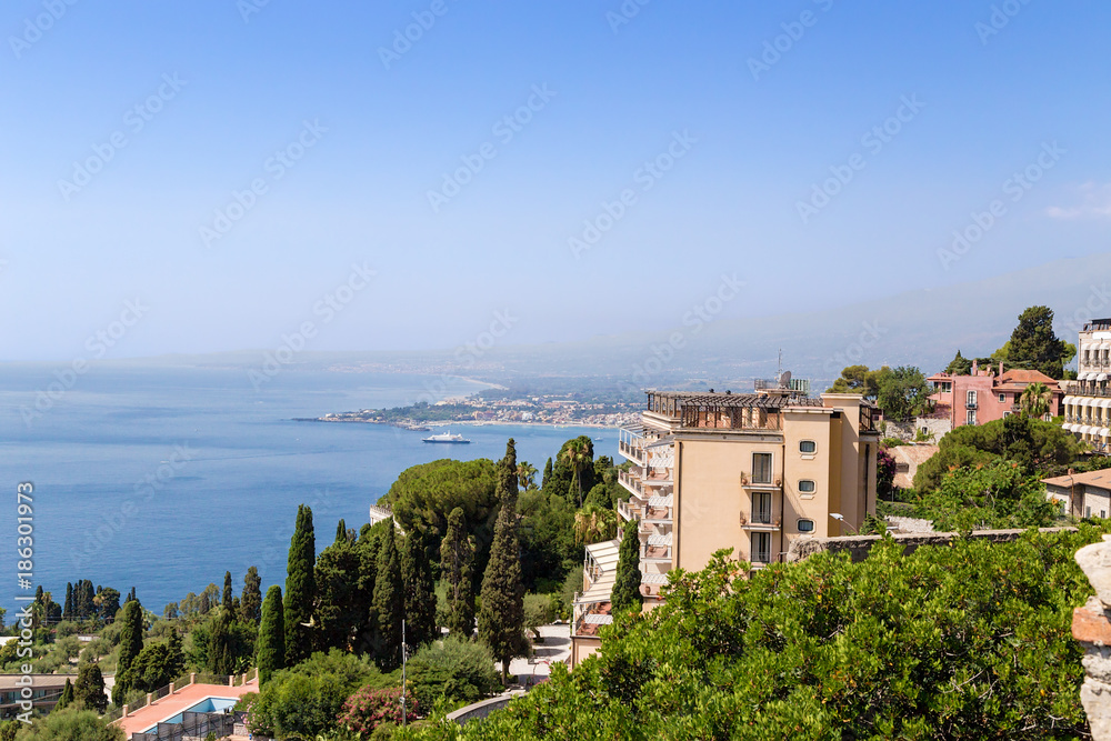 Taormina, Sicily. View of the city and the picturesque coast of the Ionian Sea