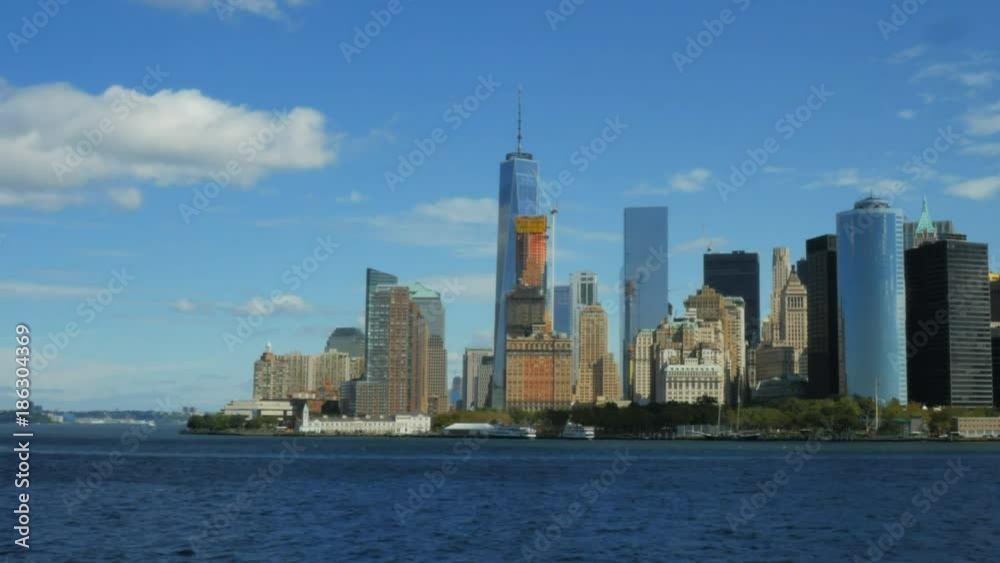 the view of the skyline of lower manhatten in new york from the staten island ferry the view of the skyline of lower manhatten in new york from the staten island ferry