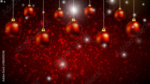Hanging Christmas red balls on a red background bokeh