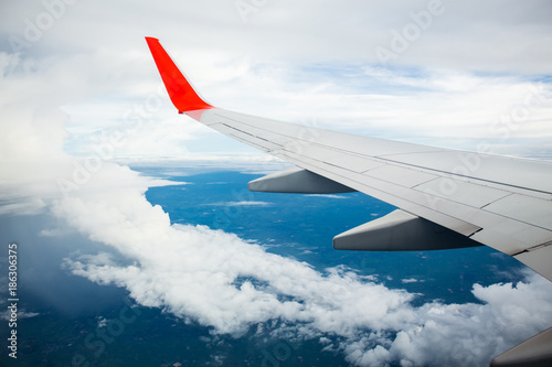 Morning sunrise with Wing of an airplane. Photo applied to tourism operators. picture for add text message or frame website. Traveling concept