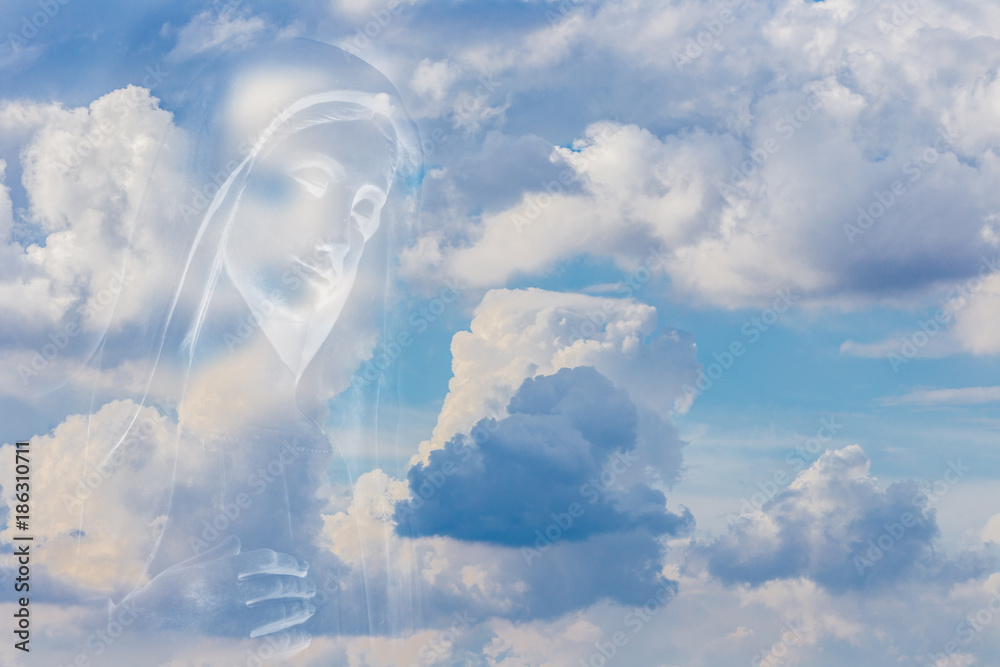 Blessed Virgin Mary on Sky background - obrazy, fototapety, plakaty 