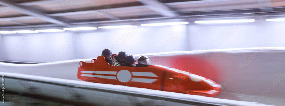 Naklejka premium bob sled speeding in an ice channel