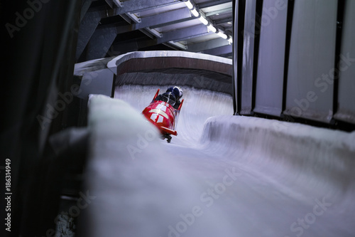 bob sled speeding in an ice channel